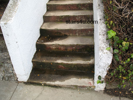 stairway with water setting on steps or treads