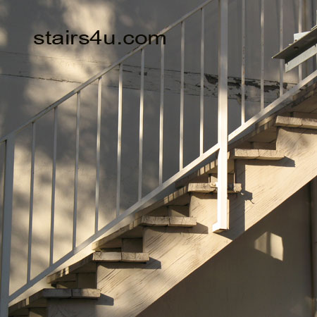 warped 2x6 wood exterior stair treads